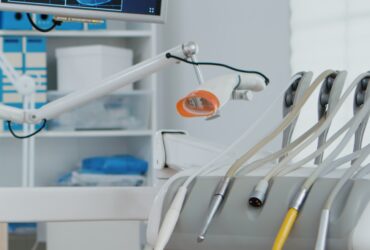 Interior of modern dental office in hospital with dentistry orthodontic furniture.